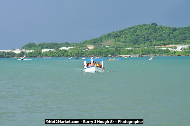 Lucea Cross the Harbour @ Lucea Car Park - All Day Event - Cross the Harbour Swim, Boat Rides, and Entertainment for the Family - Concert Featuring: Bushman, George Nooksl, Little Hero, Bushi One String, Dog Rice and many local Artists - Friday, August 1, 2008 - Lucea, Hanover Jamaica - Photographs by Net2Market.com - Barry J. Hough Sr. Photojournalist/Photograper - Photographs taken with a Nikon D300 - Negril Travel Guide, Negril Jamaica WI - http://www.negriltravelguide.com - info@negriltravelguide.com...!