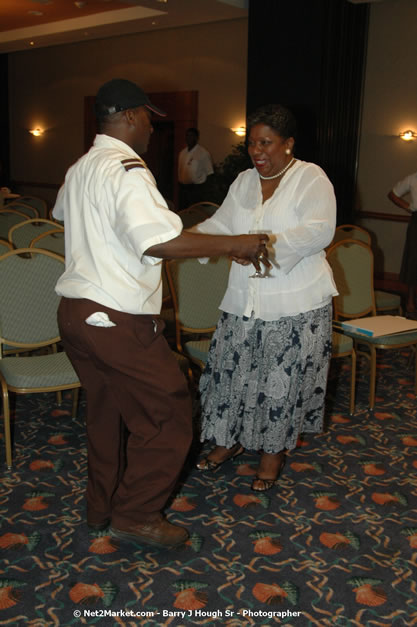 Red Cap Porters Awards - Minister of Tourism, Hon. Edmund Bartlett - Director of Tourism, Basil Smith - Friday, December 14, 2007 - Holiday Inn Sunspree, Montego Bay, Jamaica W.I. - Photographs by Net2Market.com - Barry J. Hough Sr, Photographer - Negril Travel Guide, Negril Jamaica WI - http://www.negriltravelguide.com - info@negriltravelguide.com...!