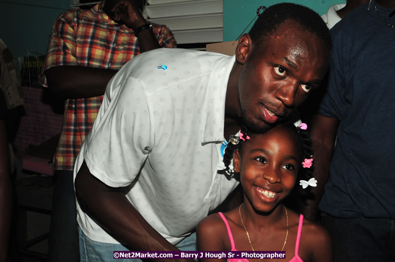 Usain Bolt of Jamaica - The Fastest Man In The World  - Usain Bolt Homecoming Celebrations - Press Conference at the Grand Bahia Principe &amp; Sherwood Content - Waldensia Primary School - Photographs by Net2Market.com - Barry J. Hough Sr. Photojournalist/Photograper - Photographs taken with a Nikon D300 - Negril Travel Guide, Negril Jamaica WI - http://www.negriltravelguide.com - info@negriltravelguide.com...!