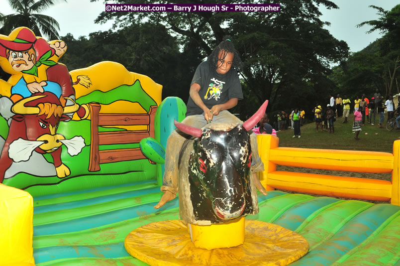 Usain Bolt of Jamaica - The Fastest Man In The World  - Usain Bolt Homecoming Celebrations - Press Conference at the Grand Bahia Principe &amp; Sherwood Content - Waldensia Primary School - Photographs by Net2Market.com - Barry J. Hough Sr. Photojournalist/Photograper - Photographs taken with a Nikon D300 - Negril Travel Guide, Negril Jamaica WI - http://www.negriltravelguide.com - info@negriltravelguide.com...!