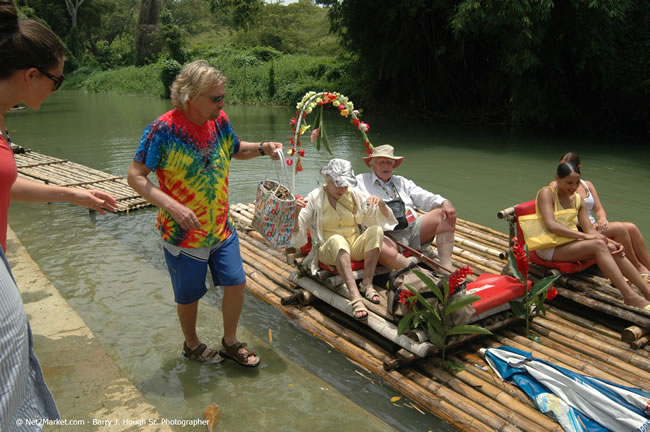 Rafting on the Martha Brae - Virgin Atlantic Inaugural Flight To Montego Bay, Jamaica Photos - Sir Richard Bronson, President & Family, and 450 Passengers - Rafting on the Martha Brae - Tuesday, July 4, 2006 - Negril Travel Guide, Negril Jamaica WI - http://www.negriltravelguide.com - info@negriltravelguide.com...!